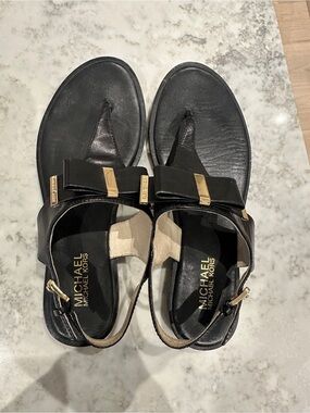 Michael Kors Black Leather Bow Sandals with Gold Hardware
